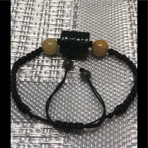 beautiful dark green jade on nylon bracelet